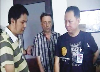 The owner of Sexy Boutique is led away by police